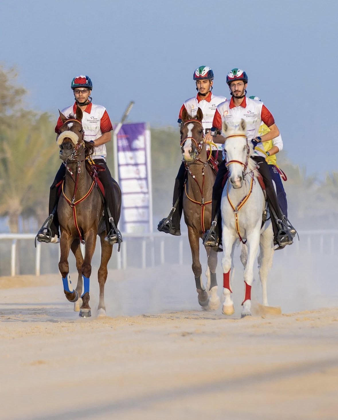 Three riders on the course at Butheeb